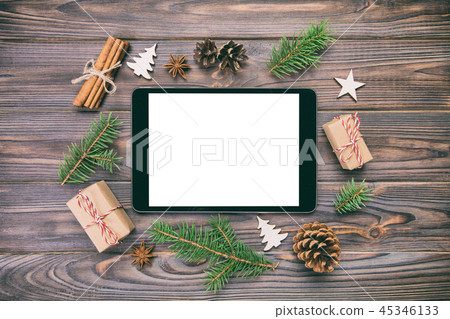 Digital tablet mock up with rustic Christmas Digital tablet mock up with rustic Christmas 45346133