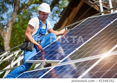 Stand-alone exterior solar panel system installation, renewable green energy generation concept. 45346182