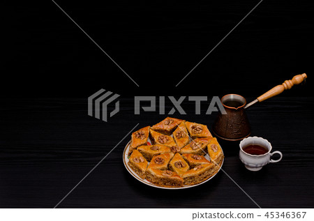 Cezve, coffee mug and a plate 45346367