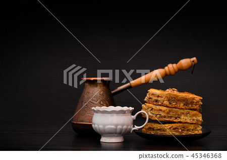 Cezve, coffee mug and a plate  45346368