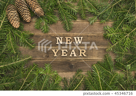Inscription New Year on a wooden background 45346716