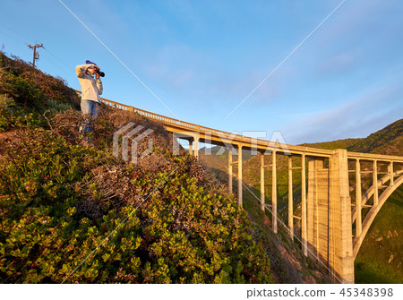 Woman tourist near Bixby Creek Bridge in California 45348398