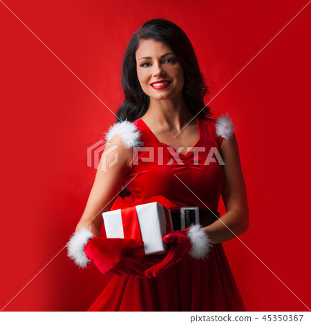 Woman in red Santa Claus outfit 45350367