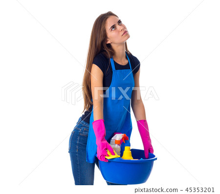 Woman holding cleaning things in washbowl Woman holding cleaning things in washbowl 45353201