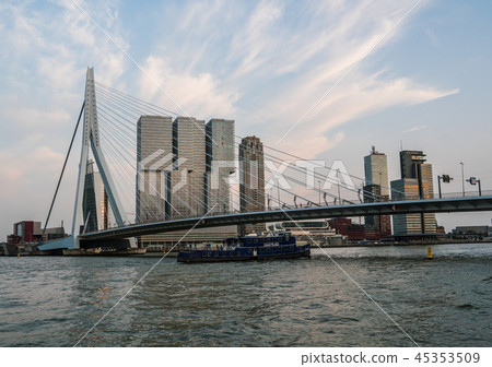 Evening Rotterdam Skyline with the Ship under Erasmus Bridge Kop van Zuid neighborhood, The 45353509