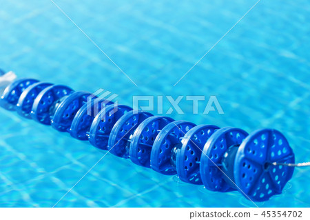 Swimming pool water with blue lane marker 45354702