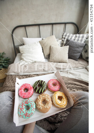 Crop woman having breakfast on bed Crop woman having breakfast on bed 45354794