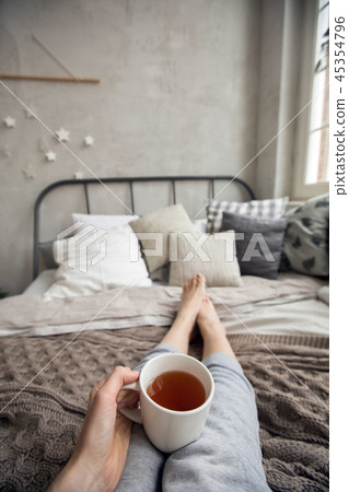 Crop woman having breakfast on bed Crop woman having breakfast on bed 45354796