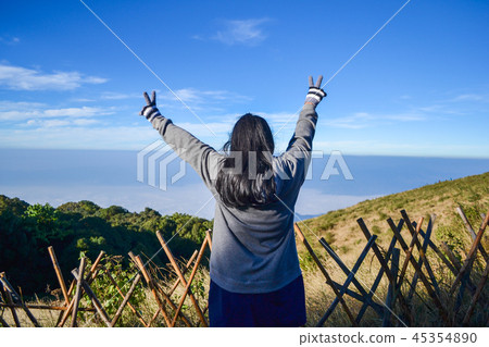 girl happy on mountain view 45354890