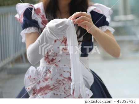 Maid wearing white gloves Maid wearing white gloves 45355453