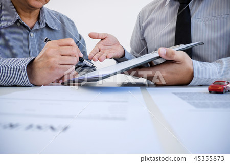 Car and Home insurance concept, broker agent presenting and cons Car and Home insurance concept, broker agent presenting and cons 45355873