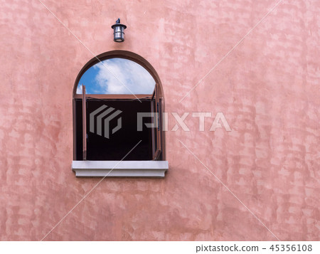 Wooden windows with orange walls Wooden windows with orange walls 45356108