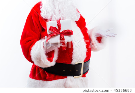 Santa holding a Christmas gift 45356693