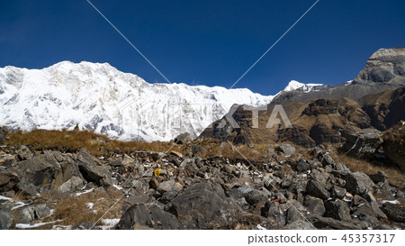 Himalayas mountain landscape in the Annapurna region. Annapurna peak in the Himalaya range, Nepal Himalayas mountain landscape in the Annapurna region. Annapurna peak in the Himalaya range, Nepal 45357317