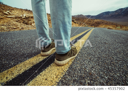 Man ready to take a new way and make a step Man ready to take a new way and make a step 45357902