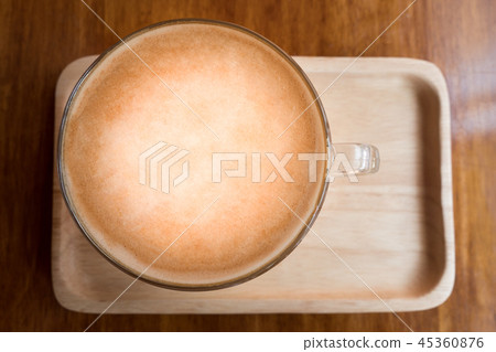 coffee latte on wood plate coffee latte on wood plate 45360876