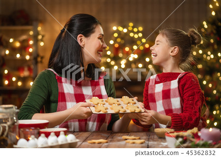 Family cooking Christmas cookies. 45362832