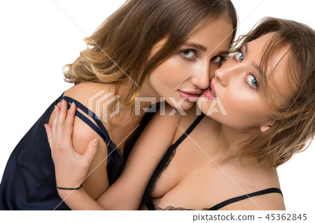 Two sexy women embracing high angle shot Two sexy women embracing high angle shot 45362845