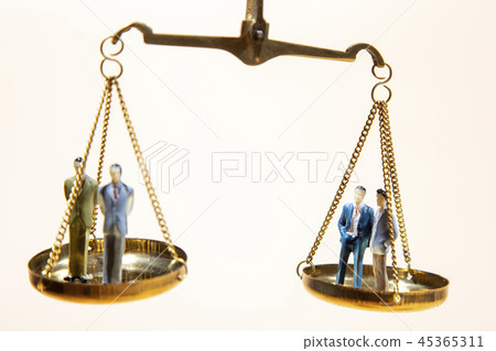 Balance between boss and employee on gold scale Balance between boss and employee on gold scale 45365311
