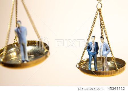 Balance between boss and employee on gold scale Balance between boss and employee on gold scale 45365312