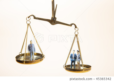 Balance between boss and employee on gold scale Balance between boss and employee on gold scale 45365342