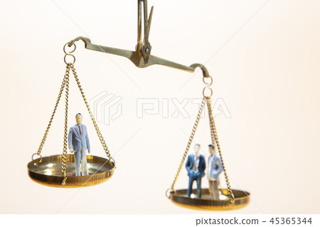 Balance between boss and employee on gold scale Balance between boss and employee on gold scale 45365344