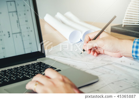 Architect or engineer working in office  45365887