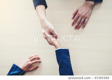 Business people colleagues shaking hands Business people colleagues shaking hands 45365888