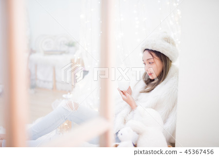 Young woman enjoying winter season.  45367456