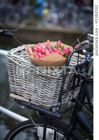 basket with tulips on a bike 45368582