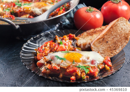 Portion of shakshuka on a plate Portion of shakshuka on a plate 45369810