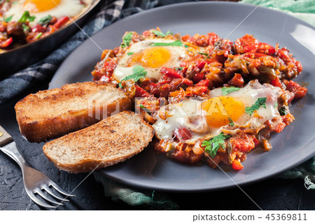 Portion of shakshuka on a plate Portion of shakshuka on a plate 45369811