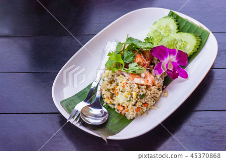 Fried rice with shrimp on the white ceramic dish. Fried rice with shrimp on the white ceramic dish. 45370868