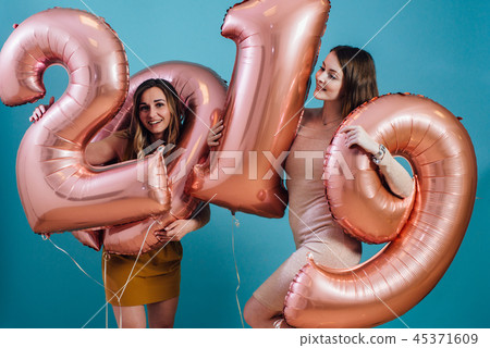 Happy new year and Merry Christmas Beautiful young women with balloons 45371609