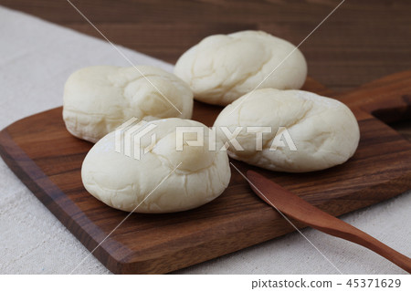 White bread table on wooden cutting board 45371629