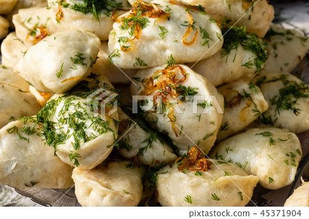dumplings with fried onions at a street food 45371904