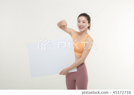 a woman holding an ad board on a white background a woman holding an ad board on a white background 45372738