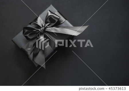 Gift box in black. Top view and copy space. 45373613