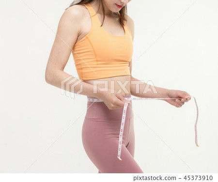 A Korean woman with a waist on a tape measure 45373910