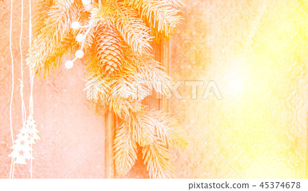 Christmas tree branch with red yellow spot close-up 45374678