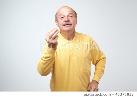 handsome man showing italian gesture th 45375932