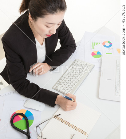 Career woman working in the office Career woman working in the office 45376515