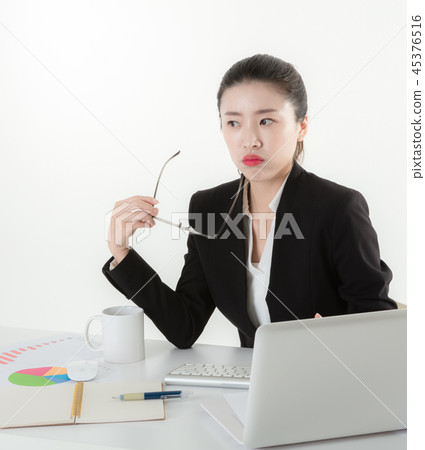 Career woman working in the office 45376516