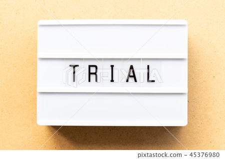 Light box with word trial on wood background 45376980