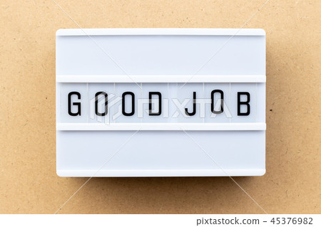 Light box with word good job on wood background Light box with word good job on wood background 45376982