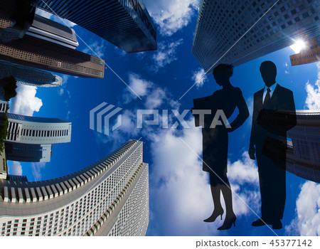 Shinjuku buildings and silhouettes of businessmen Shinjuku buildings and silhouettes of businessmen 45377142