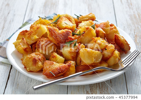 Delicious crispy Roast Potatoes, top view Delicious crispy Roast Potatoes, top view 45377994