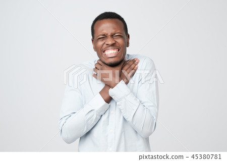 man holding hands on neck while choking man holding hands on neck while choking 45380781