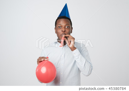 Young african man having fun on party Young african man having fun on party 45380784