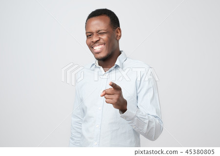 Smiling business man point you Smiling business man point you 45380805